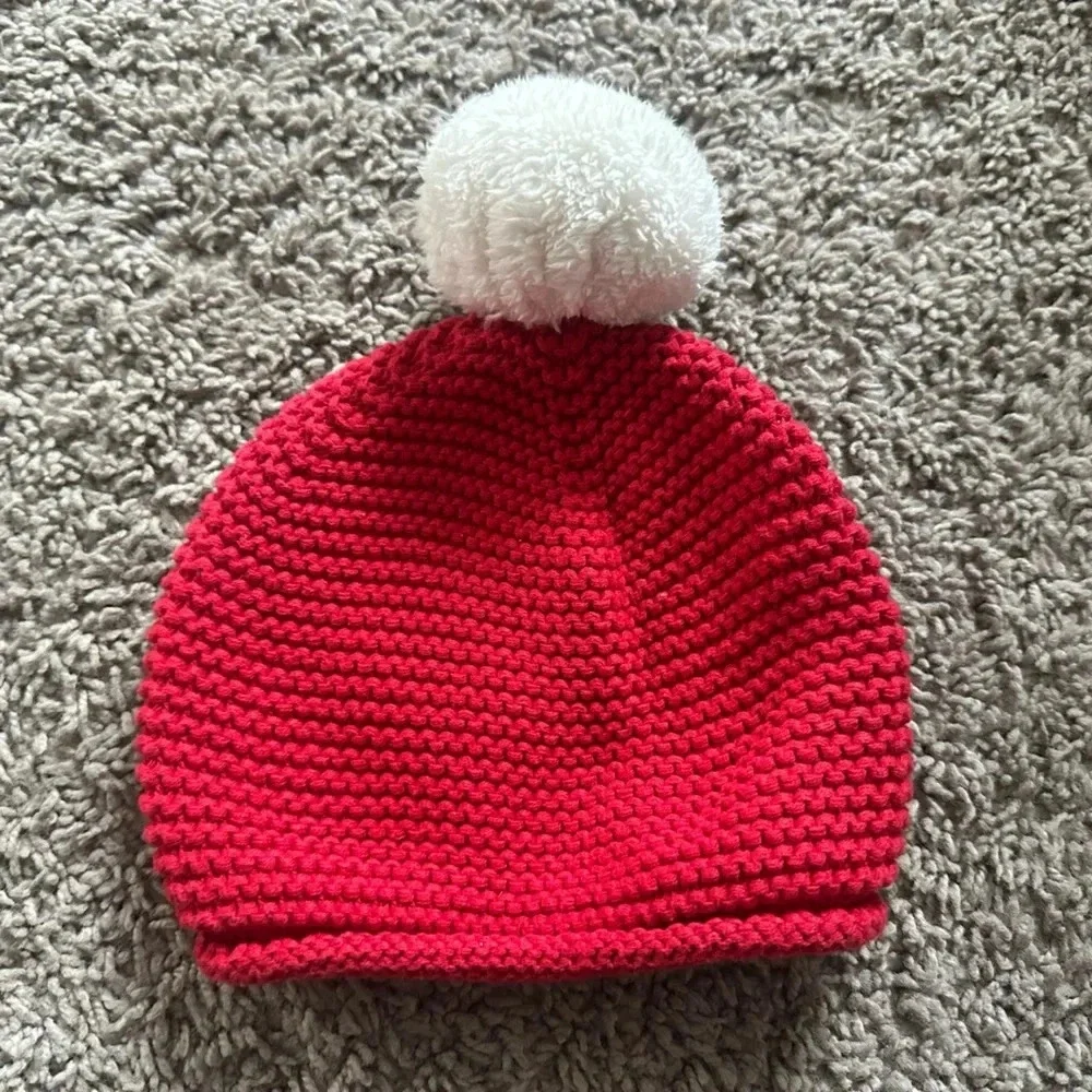 Red and white beanie.